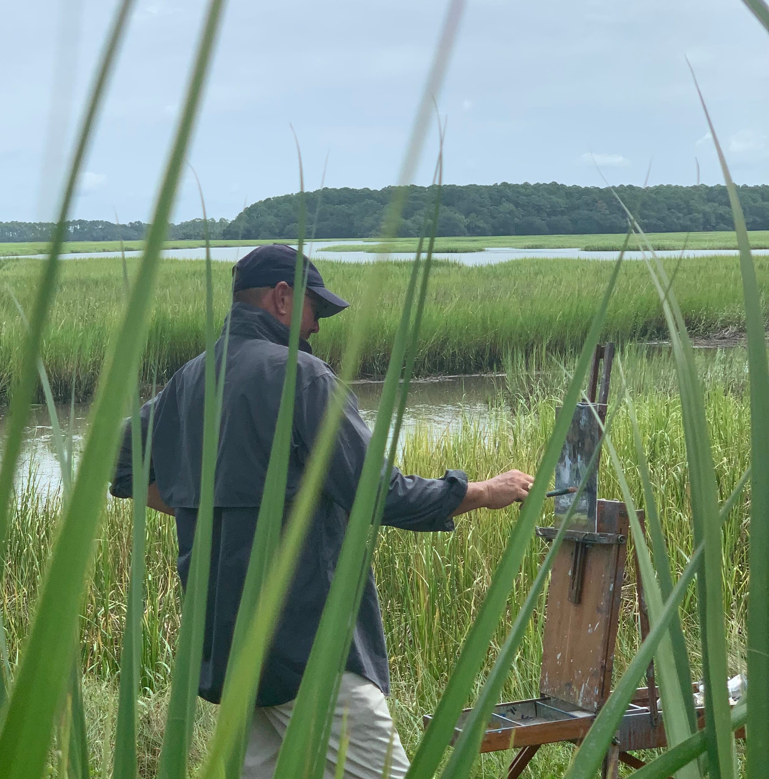 CHARLES PAINTING NEAR THE MARSH